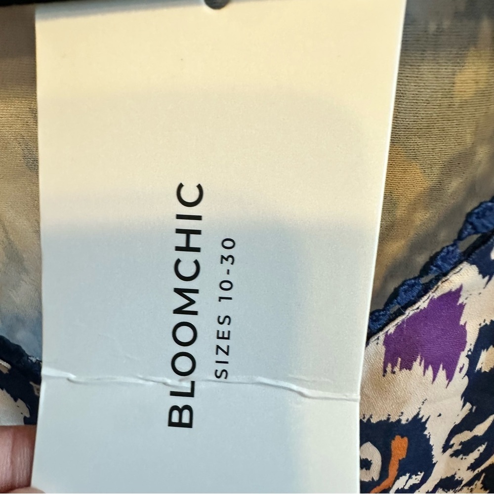 BloomChic Navy, White & Purple Ikat Peplum Blouse with Orange Accents - Picture 3 of 5